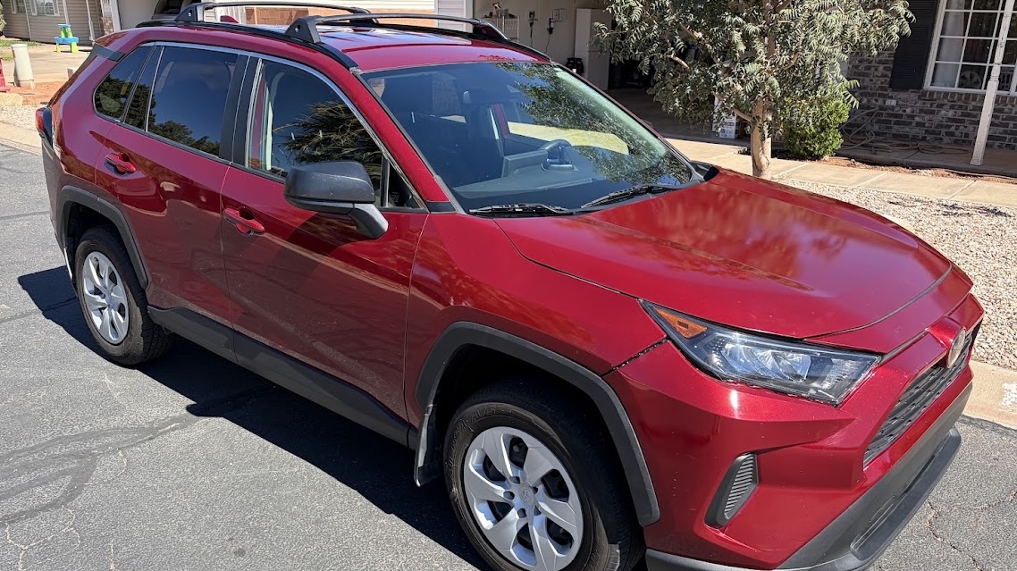 Red SUV ready for an exterior detail